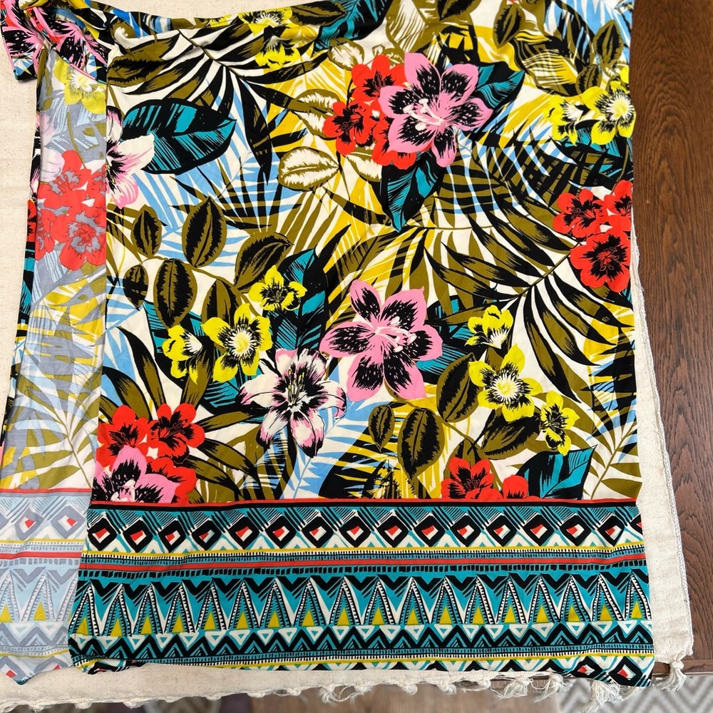 Multicolor Floral Pattern swim sarong. Miraclesuit brand. Ties at waistline.